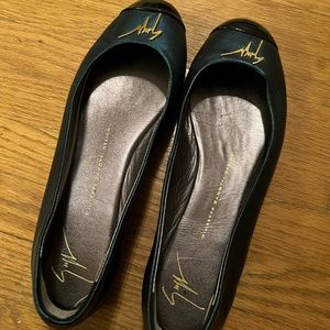 Gz -Giuseppe Zanotti’s shoes.